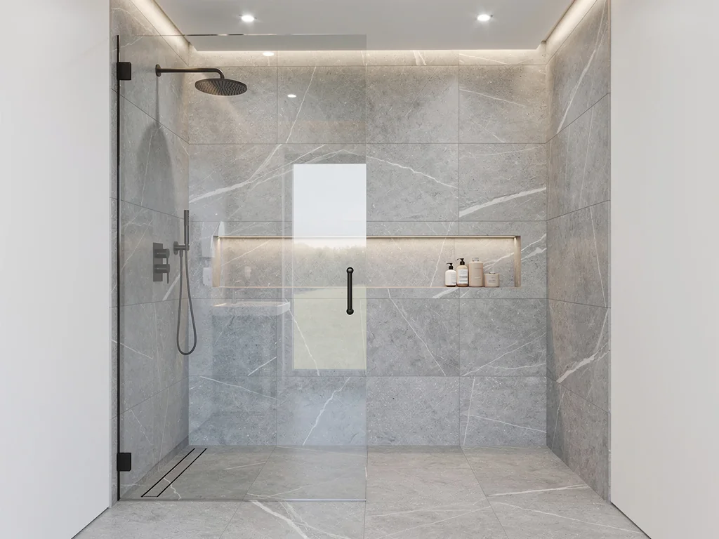 Douche à l'italienne carrelée en grand format, paroi vitrée et robinetterie noire